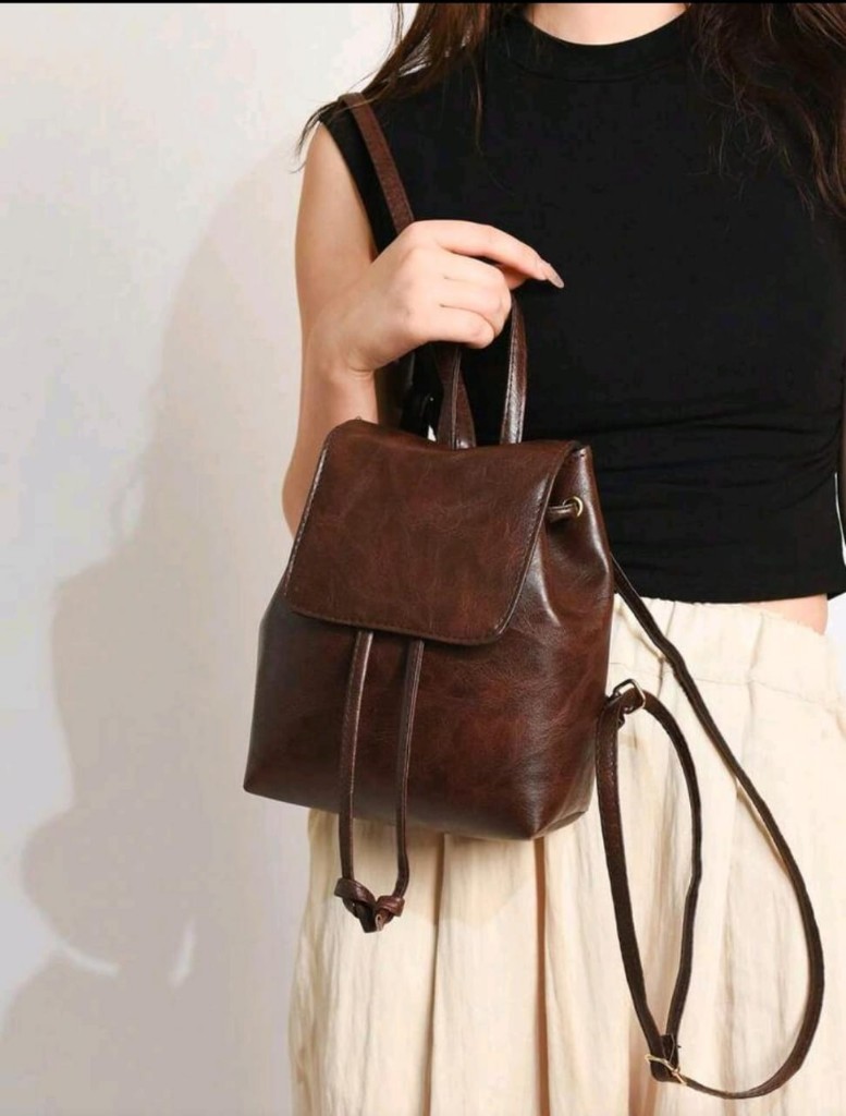 Mochila marrón carteras