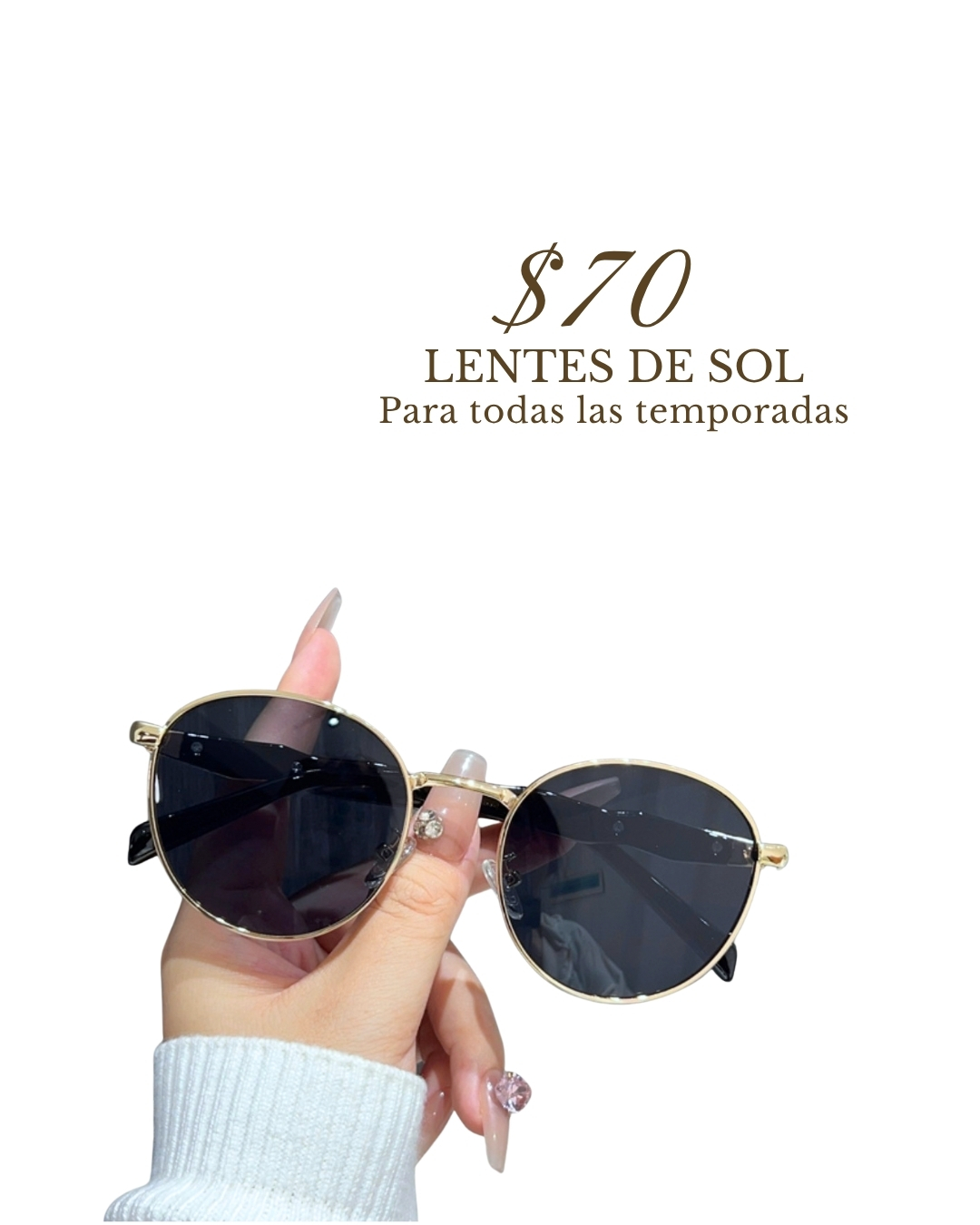 Lentes de sol negros con marco dorado