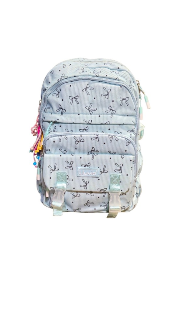 Mochila primaria turquesa con moños negros