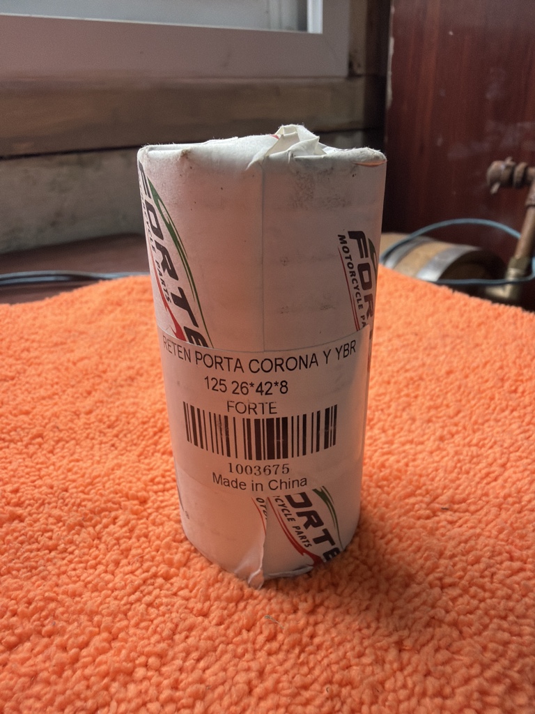 Retén Porta Corona YBR FORTE X UN