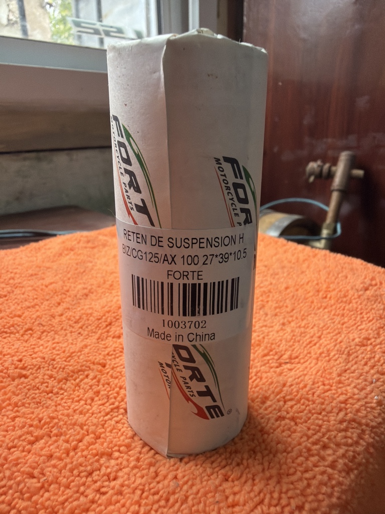 Retén suspensión 27*39*10.5 BIZ CG125/AX100 FORTE X UN