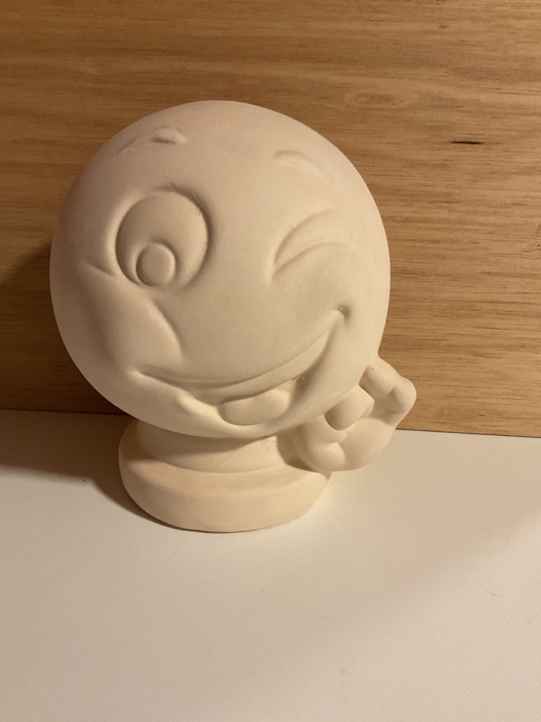 Figura emoji blanca