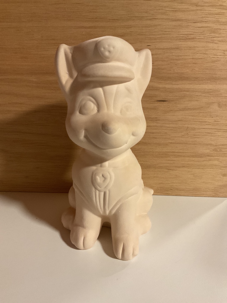Figura perrito policia blanco