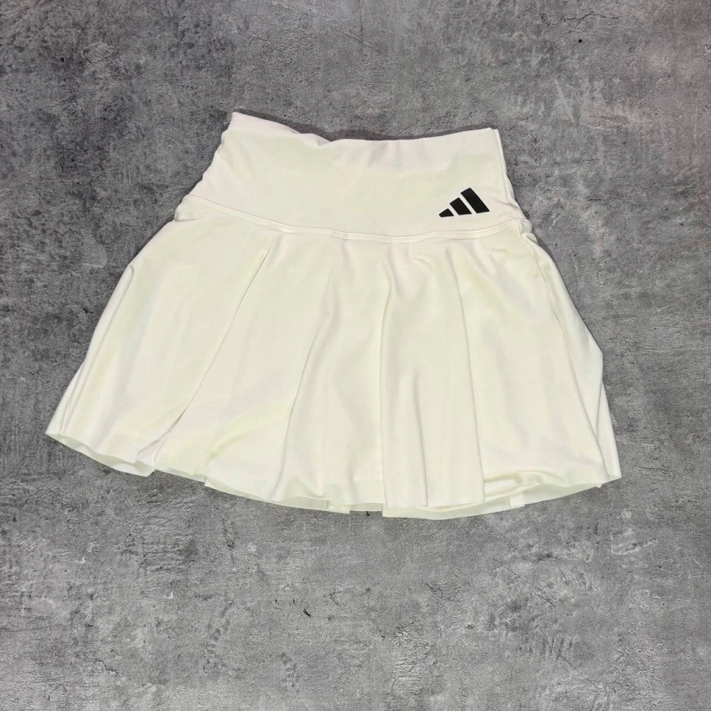 Pollera short Adidas blanco crema