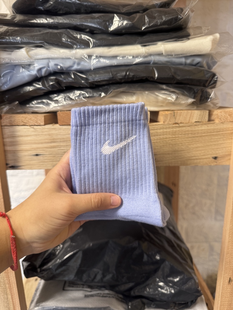 Media 1/4 Nike lila