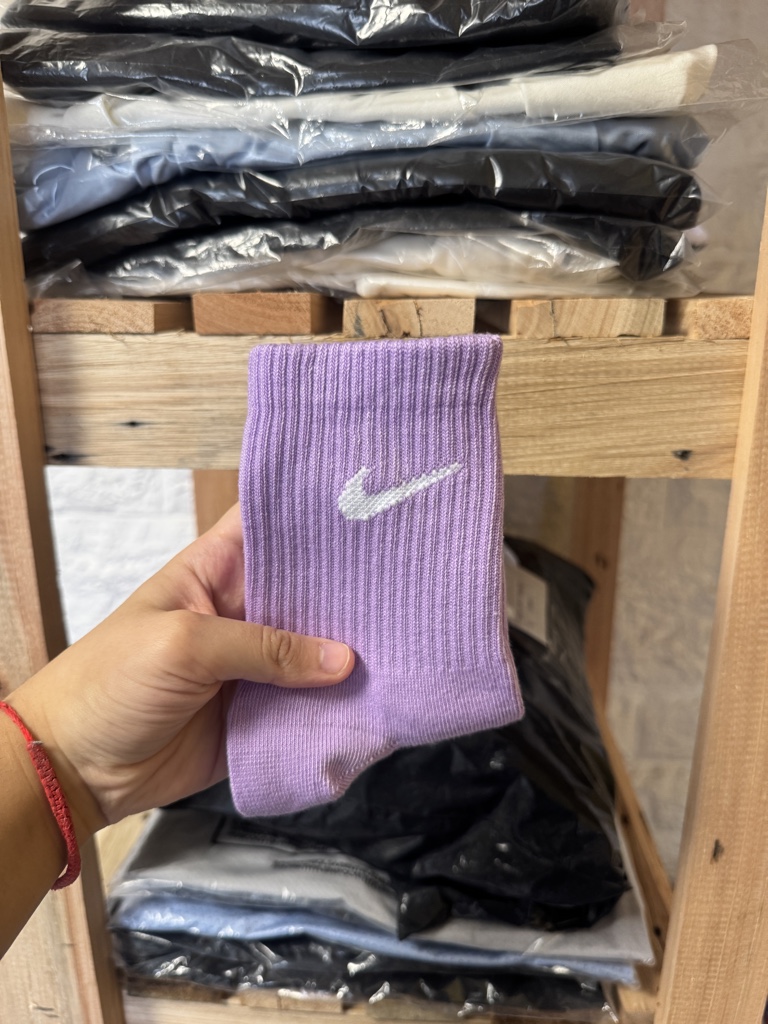 Media 1/4 Nike morado