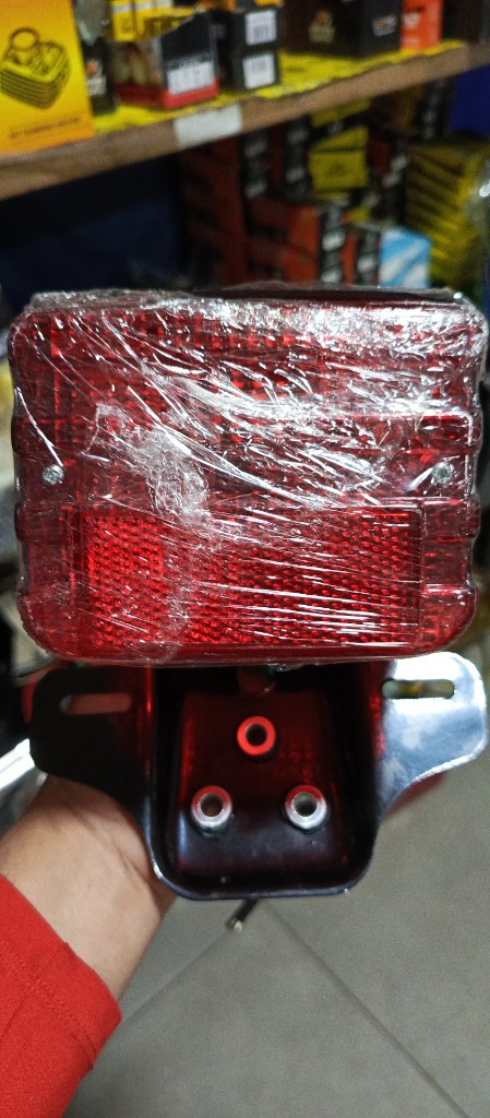 Faro trasero CG