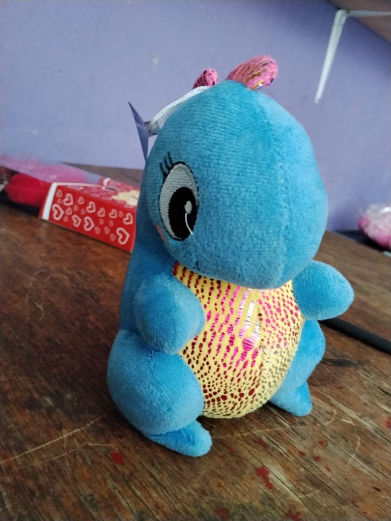 Peluche dinosaurio azul