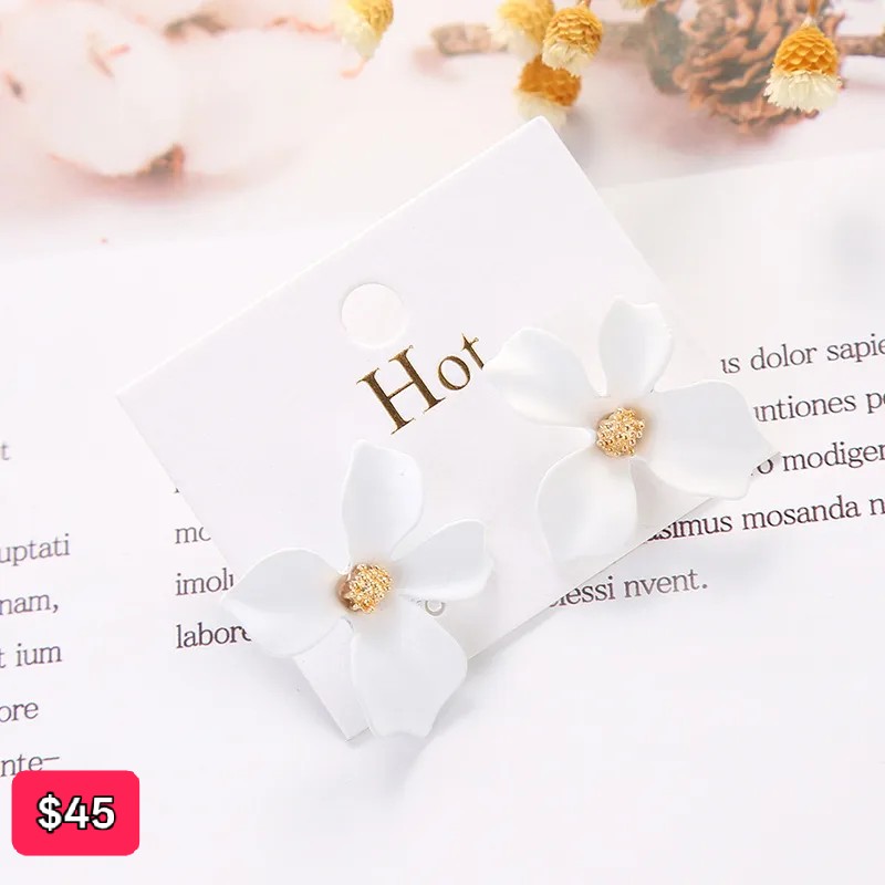 Aretes flores blancas