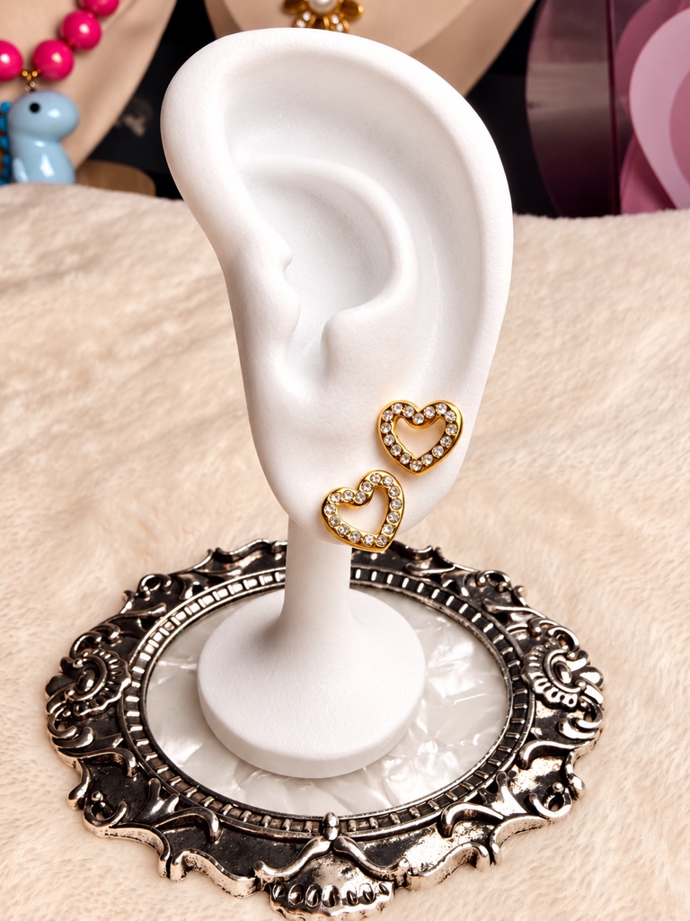 Aretes corazón dorados con zirconia