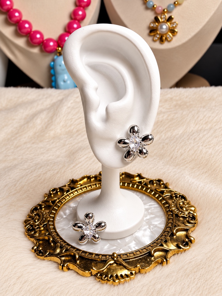 Aretes flor globo plateados con piedra