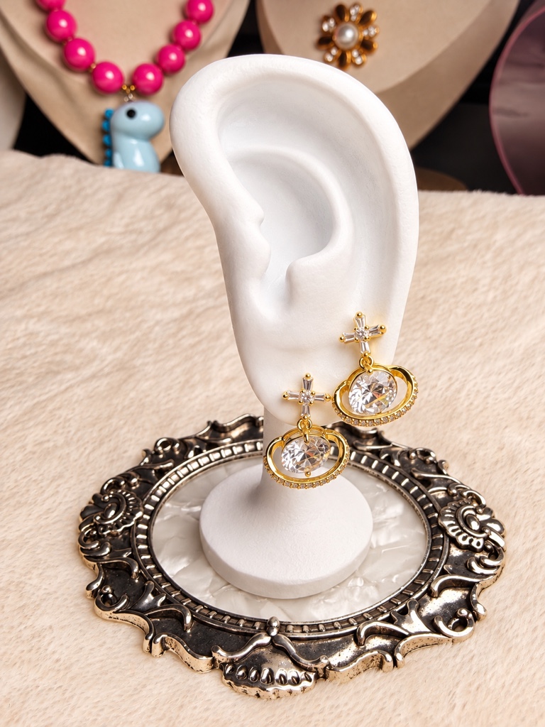 Aretes cruz planeta dorados zirconia