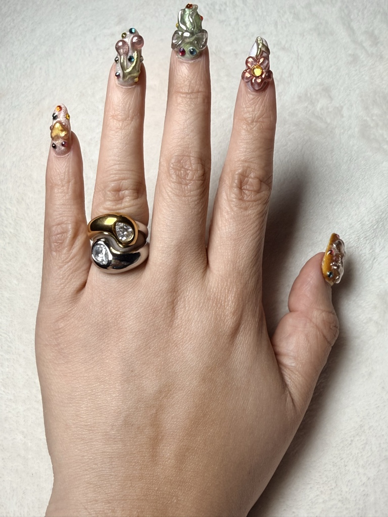 Anillo bicolor con zirconia