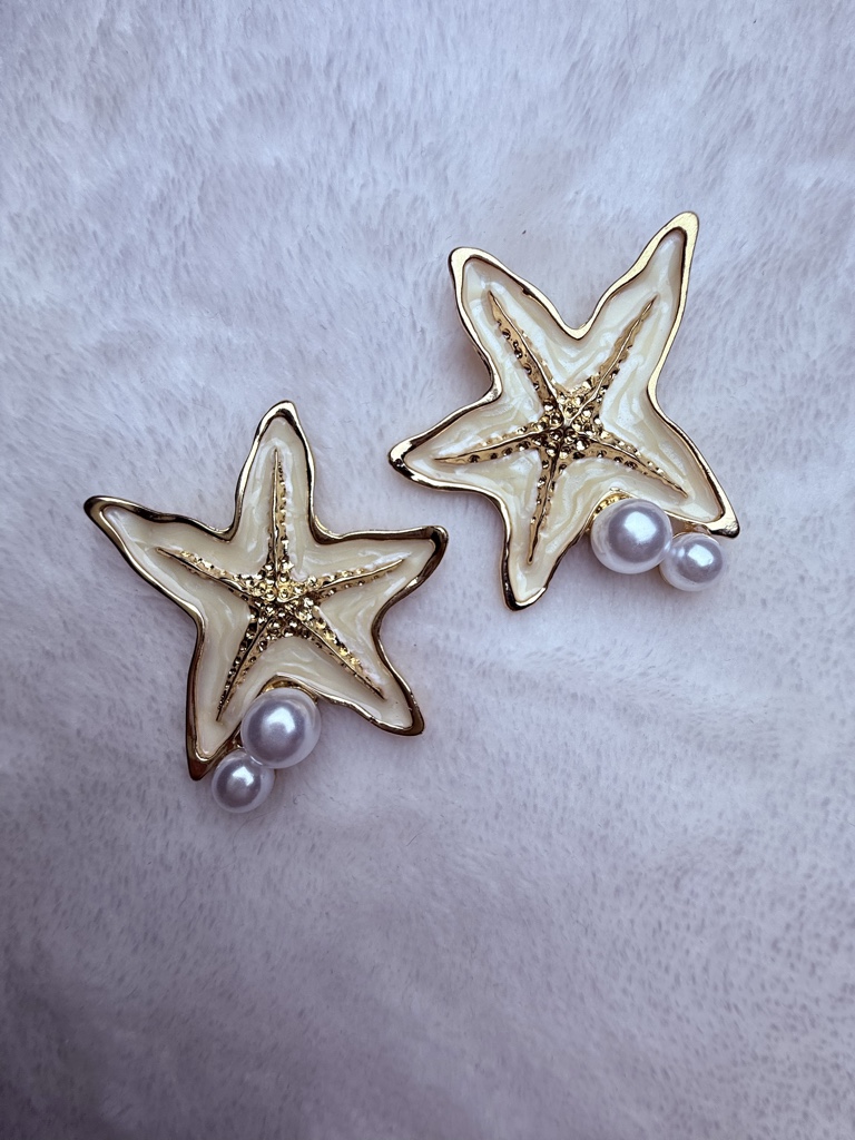 Aretes estrella con perlas