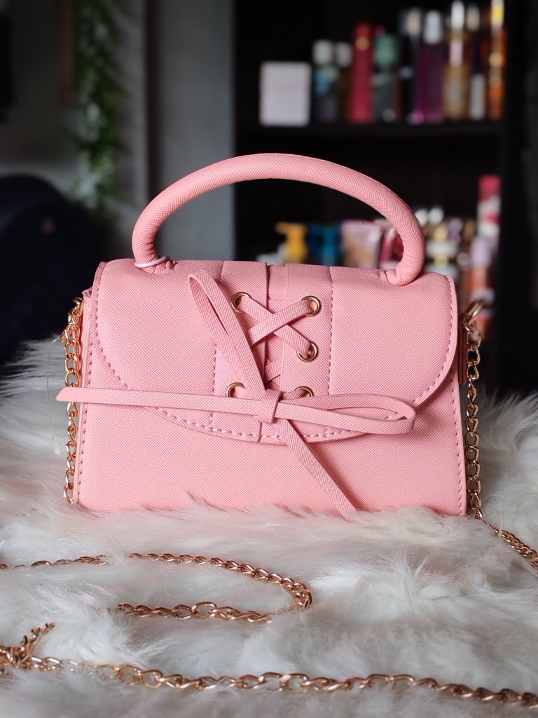 Bolso rosa de mano