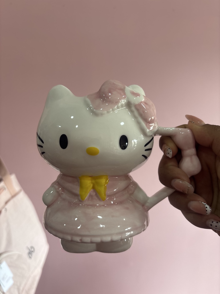 Hello Kitty adorno rosa