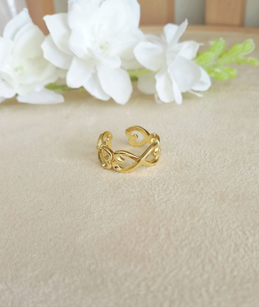 Anillo dorado corazones ajustable