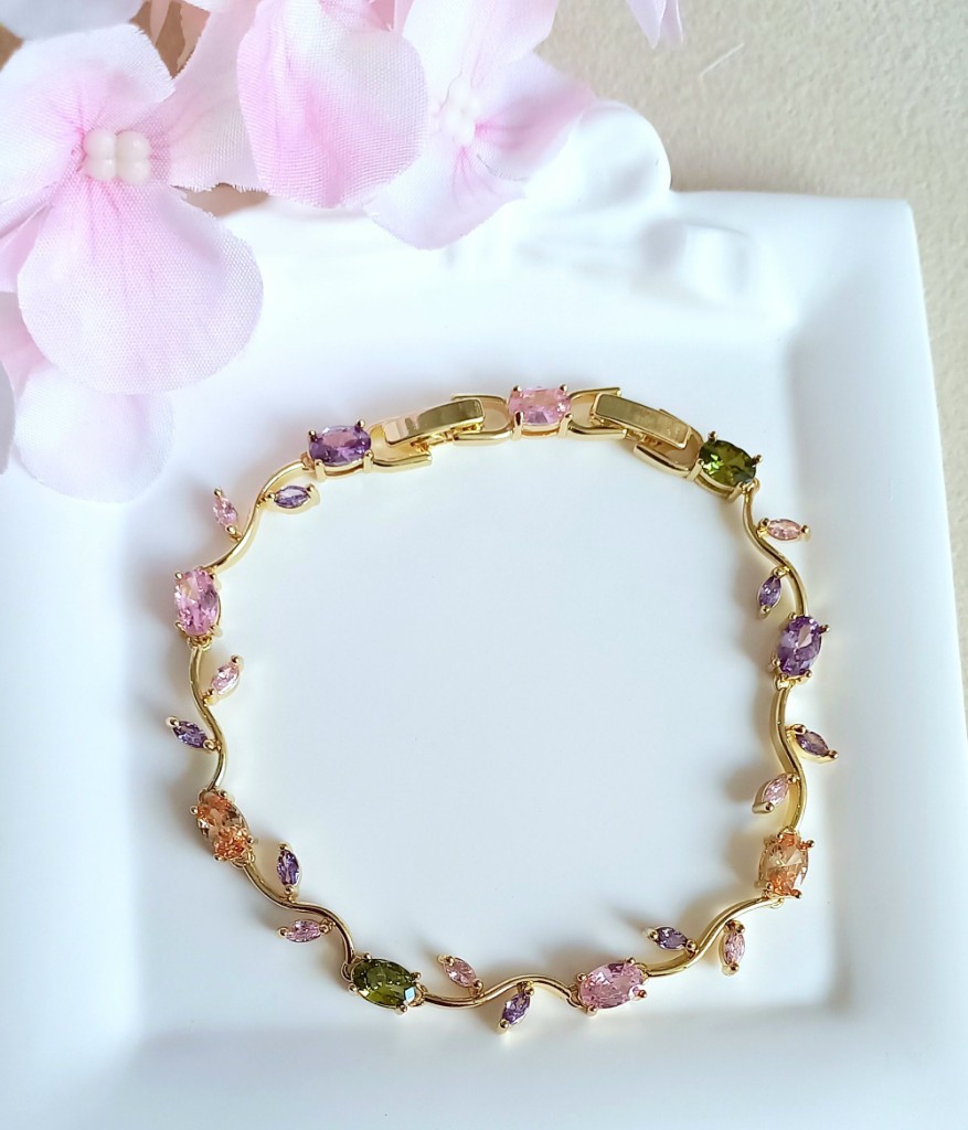 Pulsera dorada con piedras multicolor baño de oro