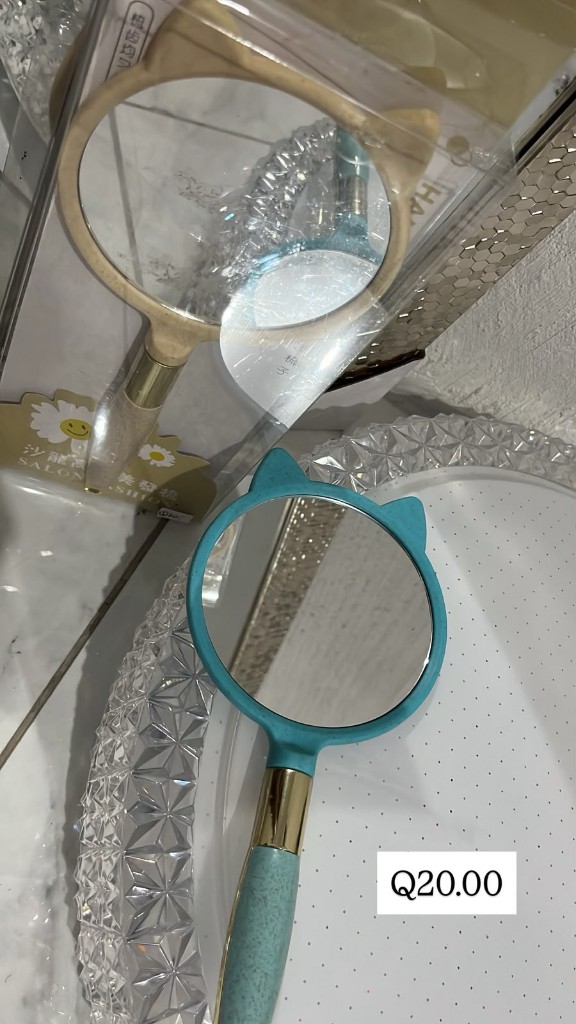 Espejo de mano azul