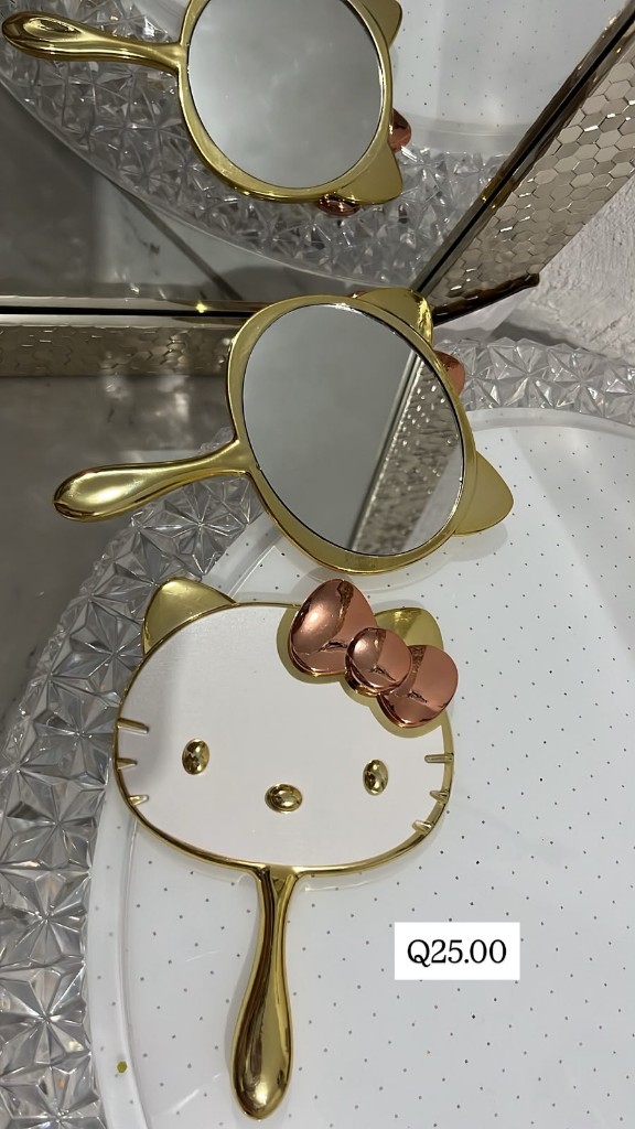 Kitty espejo dorado