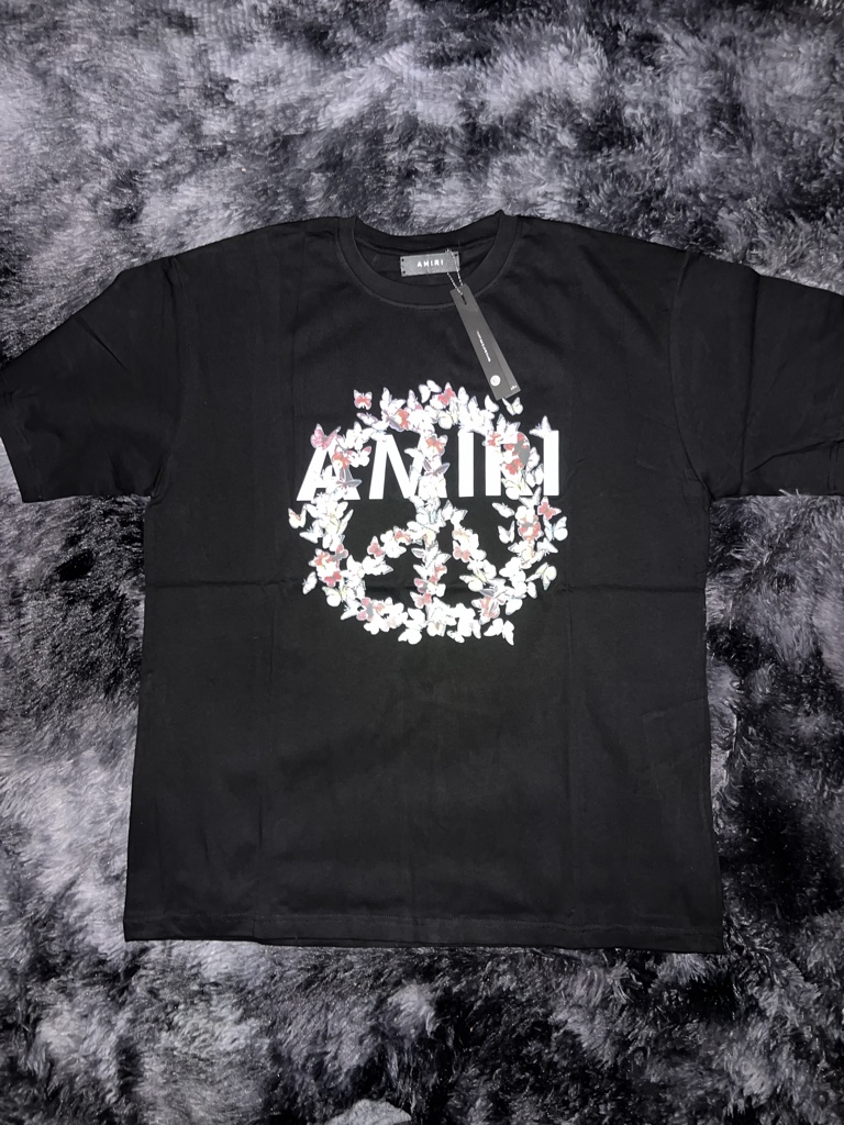 AMIRI playera negra logo floral