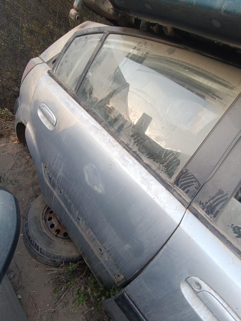Puerta trasera copiloto LATA Kia Rio JB 2009