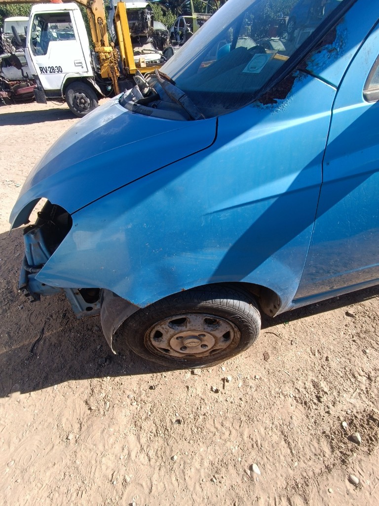 Tapabarro chófer con detalle Chevrolet spark LT 2008