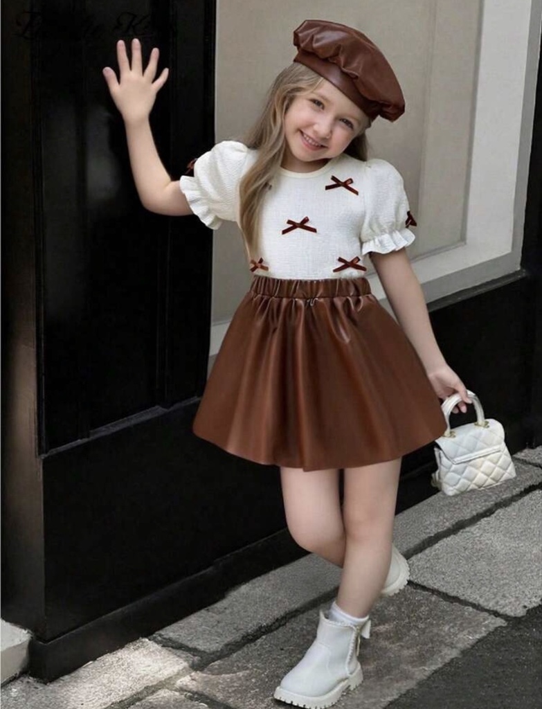 Elladie kids Nuevo conjunto de moda elegante para jóvenes europeo y americano de verano, camiseta de cuello redondo con manga abullonada y decoración de lazo + falda de PU, adecuado para uso diario,