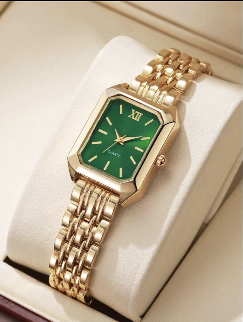 Reloj dorado esfera verde