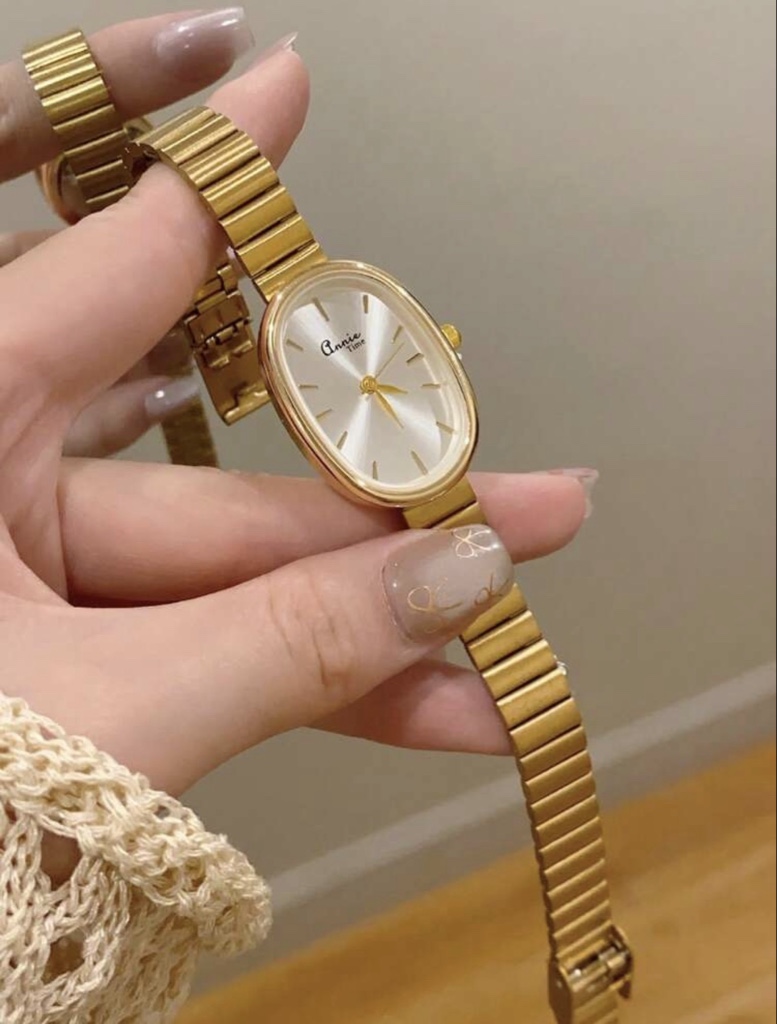Reloj dorado cuarzo minimalista