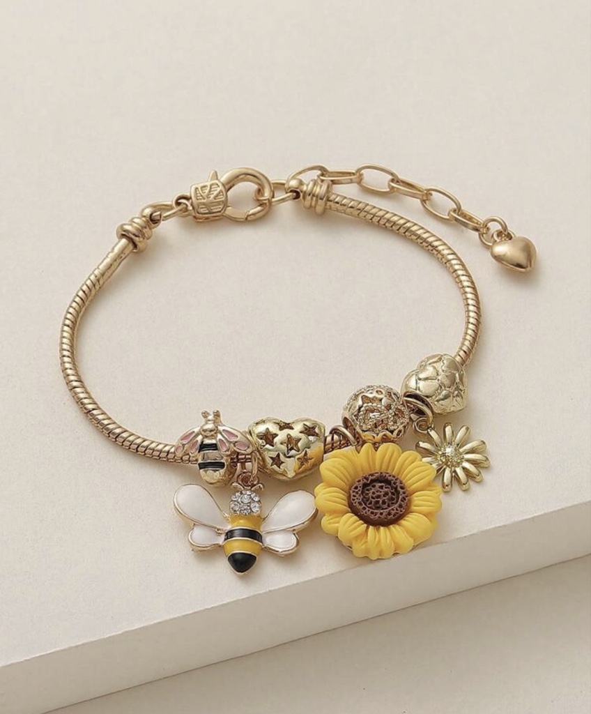 Pulsera dorada charms