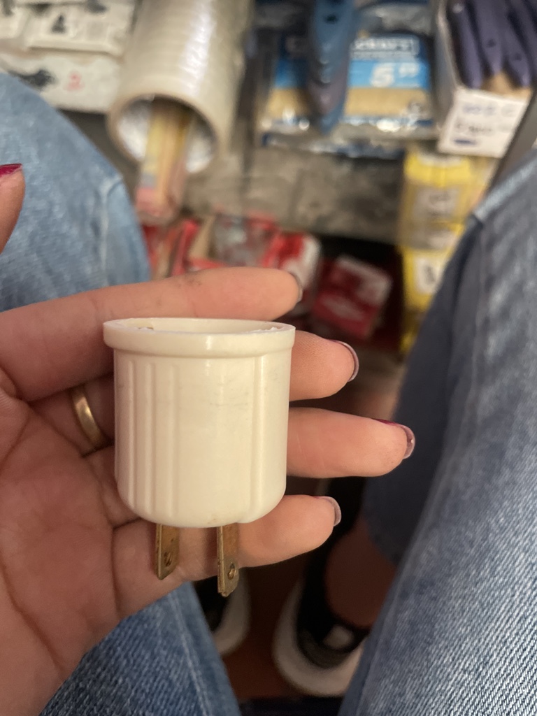 Adaptador blanco fotocelda tipo enchufable.