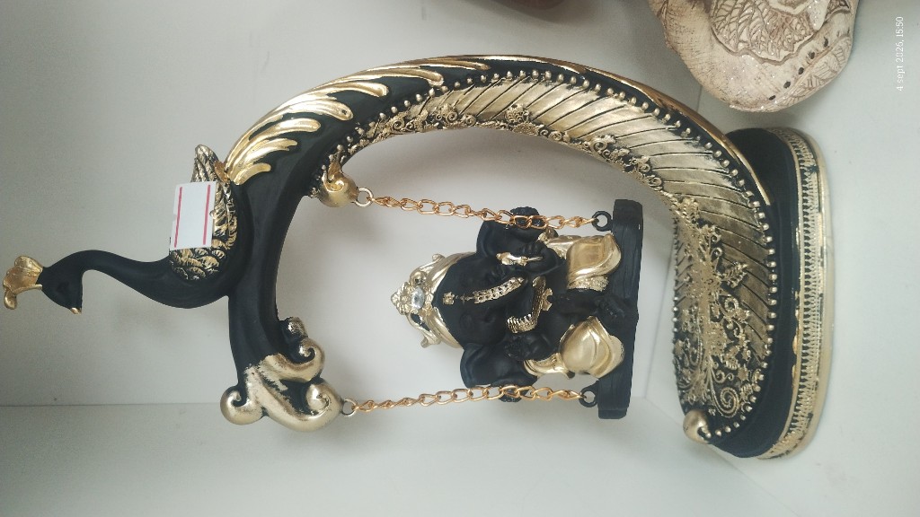 Ganesha columpio pavo
