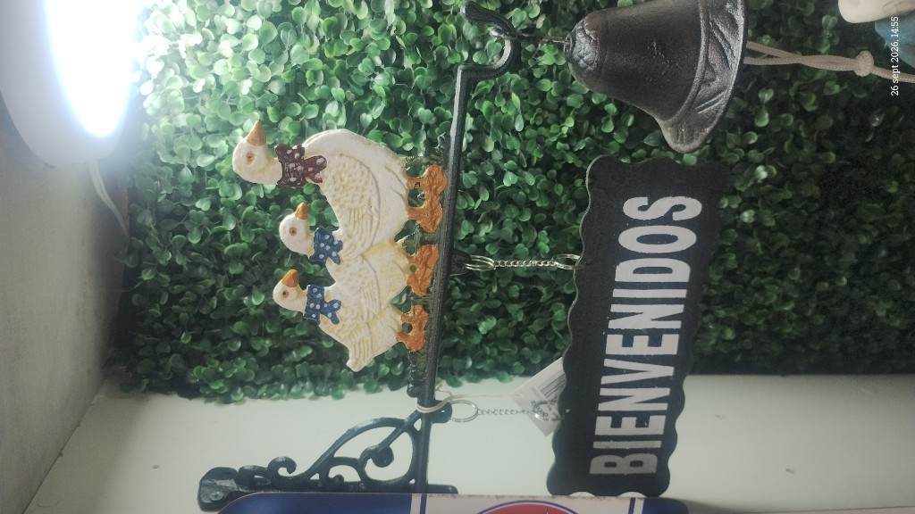 Campana con letrero