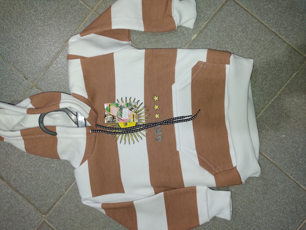 Ares buzo rayado beige y blanco