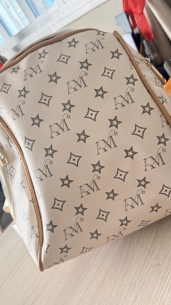 M mochila beige estampada