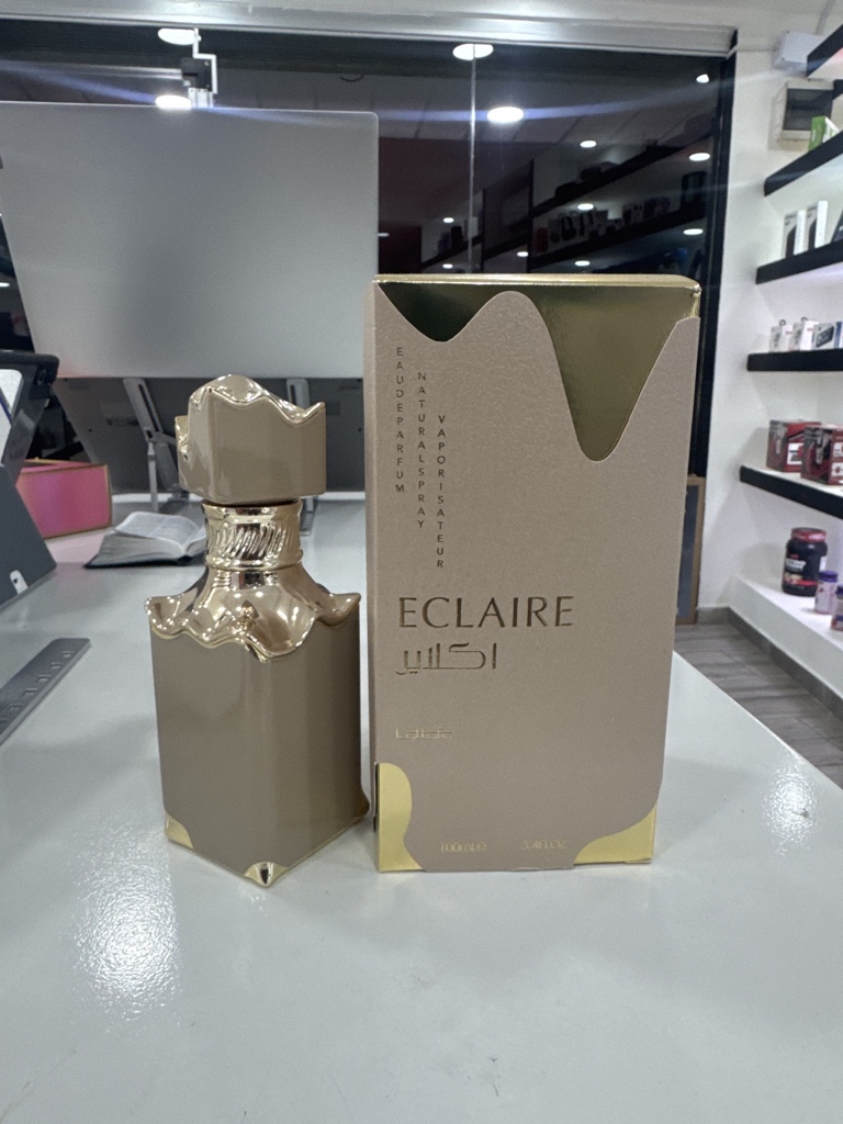 Lattafa Eclaire perfume dorado