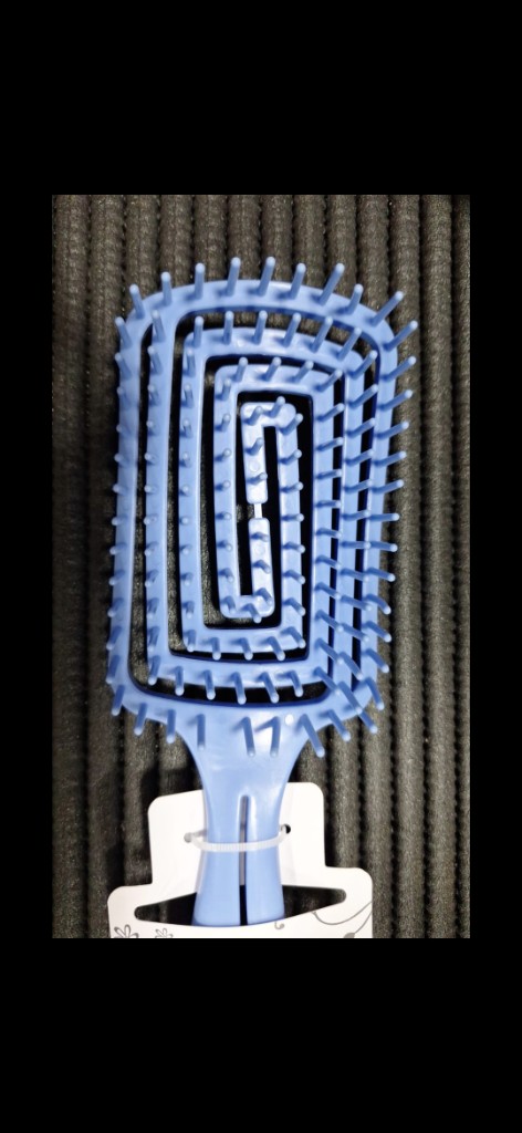 Cepillo desenredante celeste