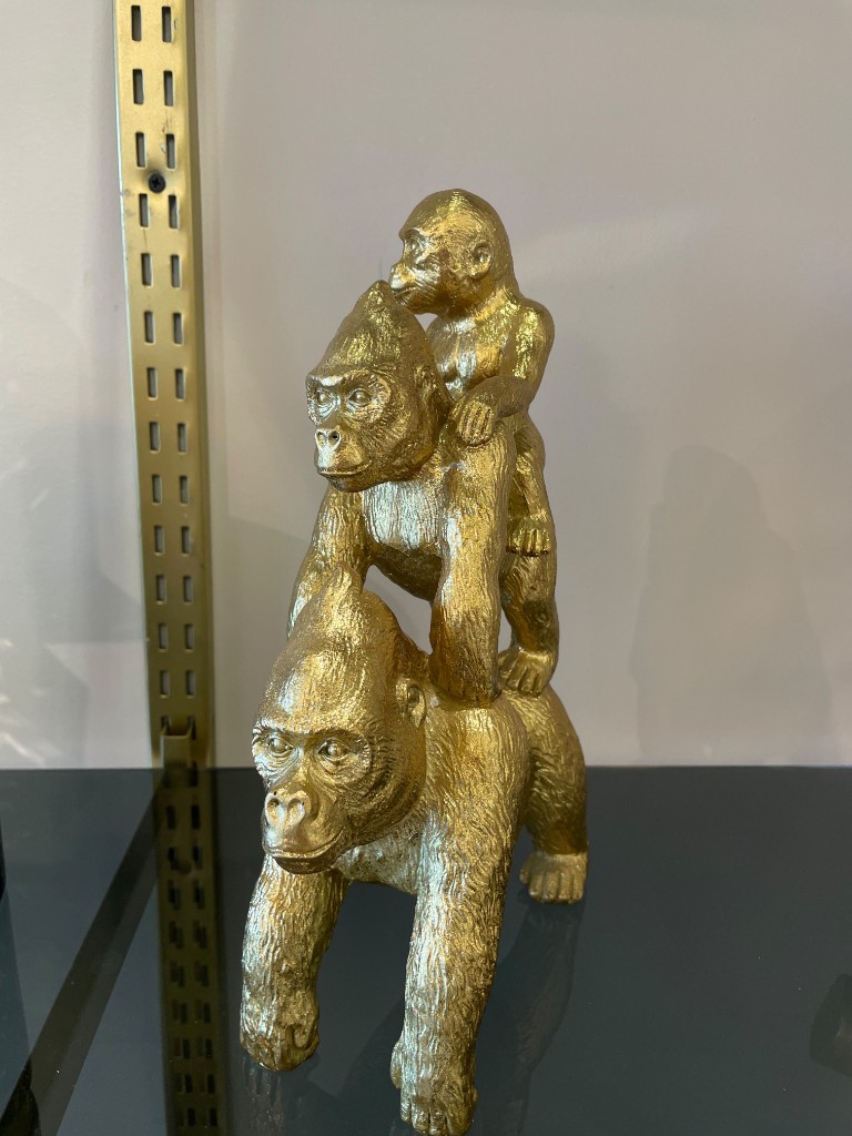 Escultura gorilas dorado