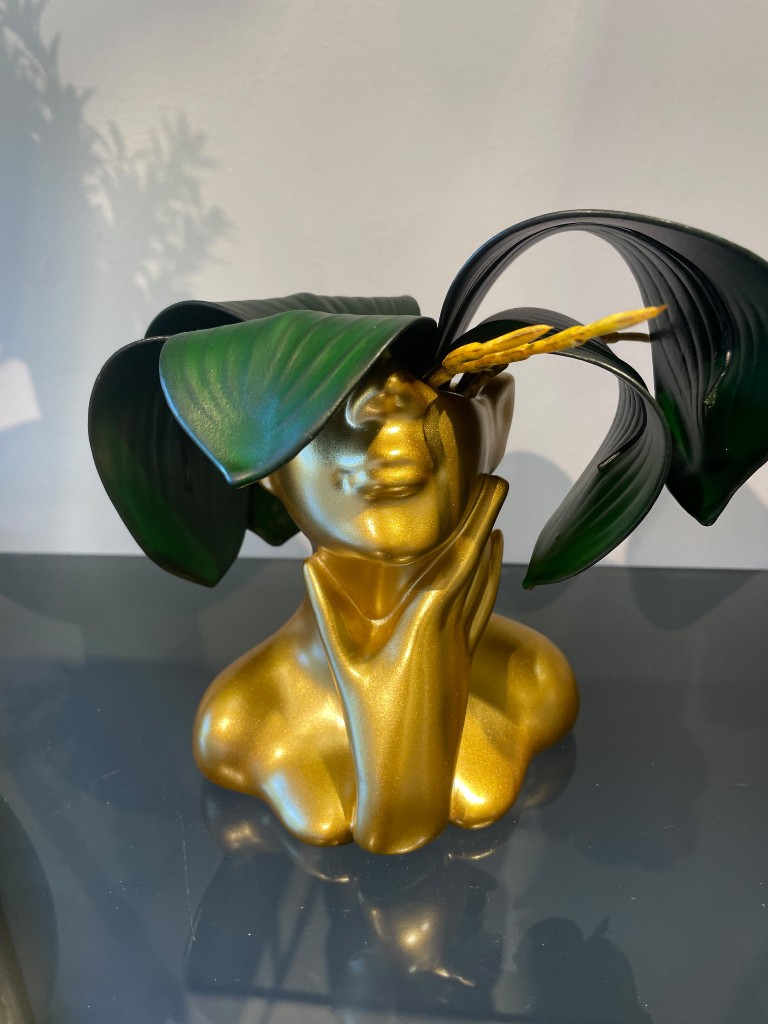 Escultura rostro dorada