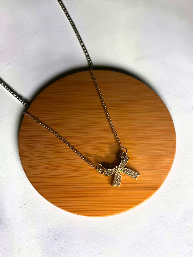 Collar moño dorado