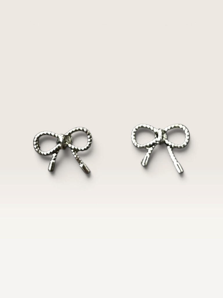 Moño plateado aretes