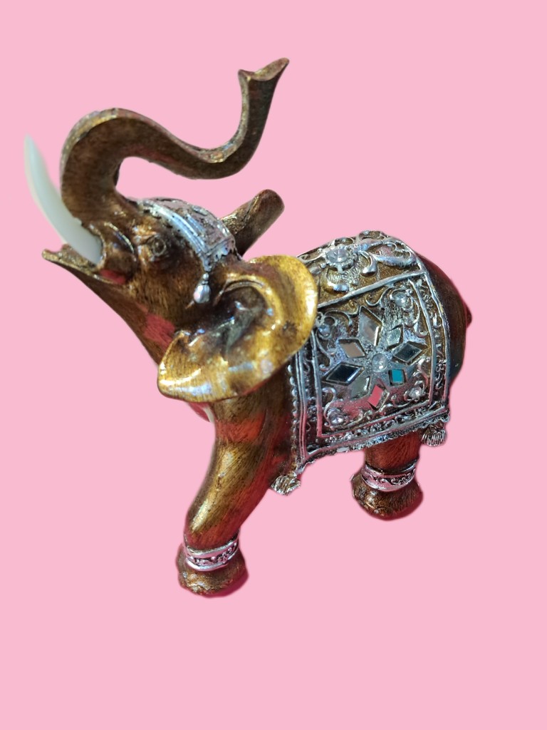 Elefante decorativo dorado