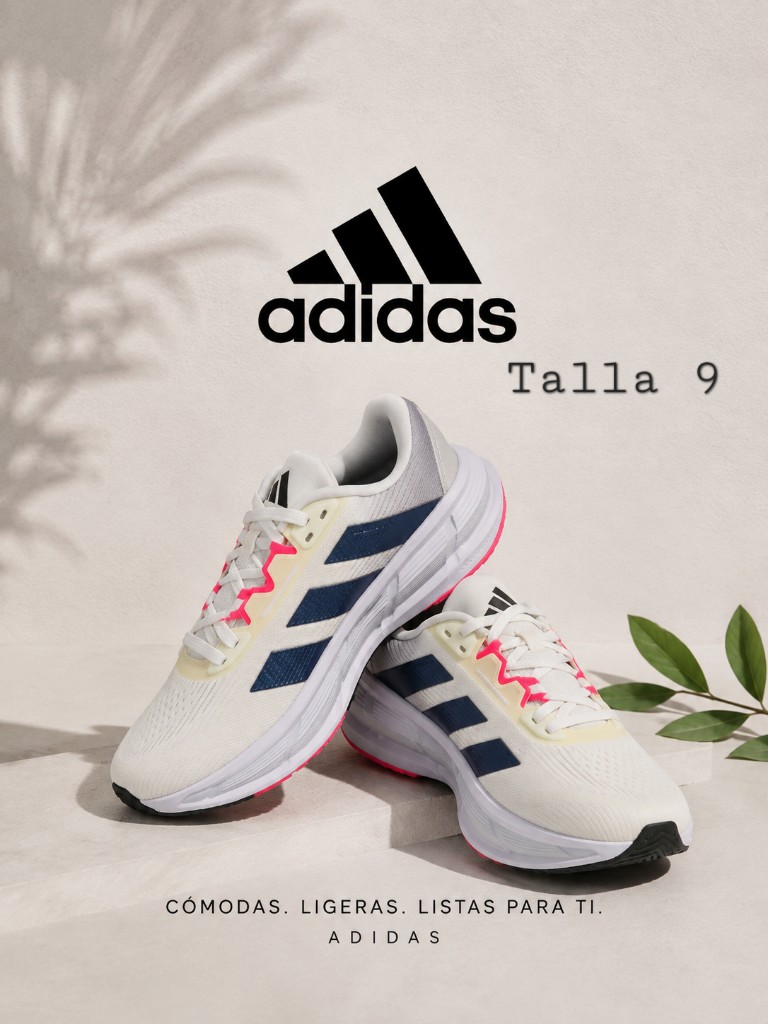 Tenis Adidas blancos con detalles en color azul
