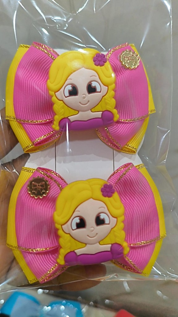 Laço rosa princesa(rapunzel)na xuxinha