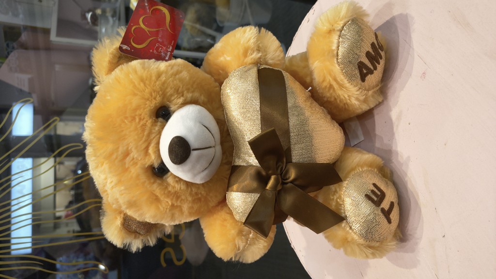 Osito peluche dorado con corazon