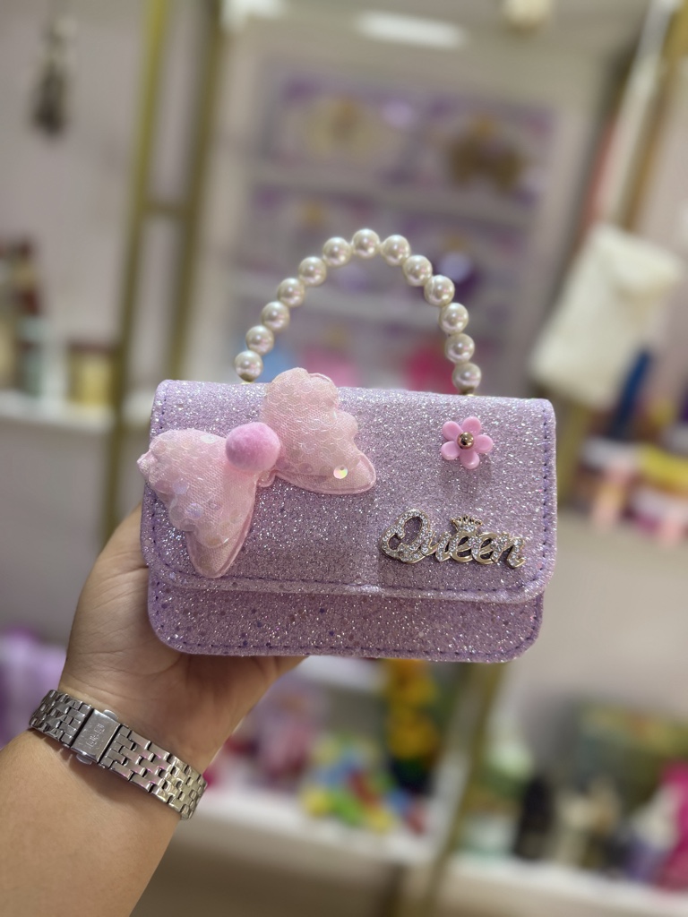 Bolso morado Queen con moño
