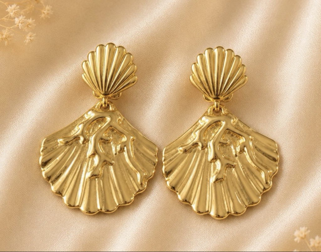Aretes dorados concha