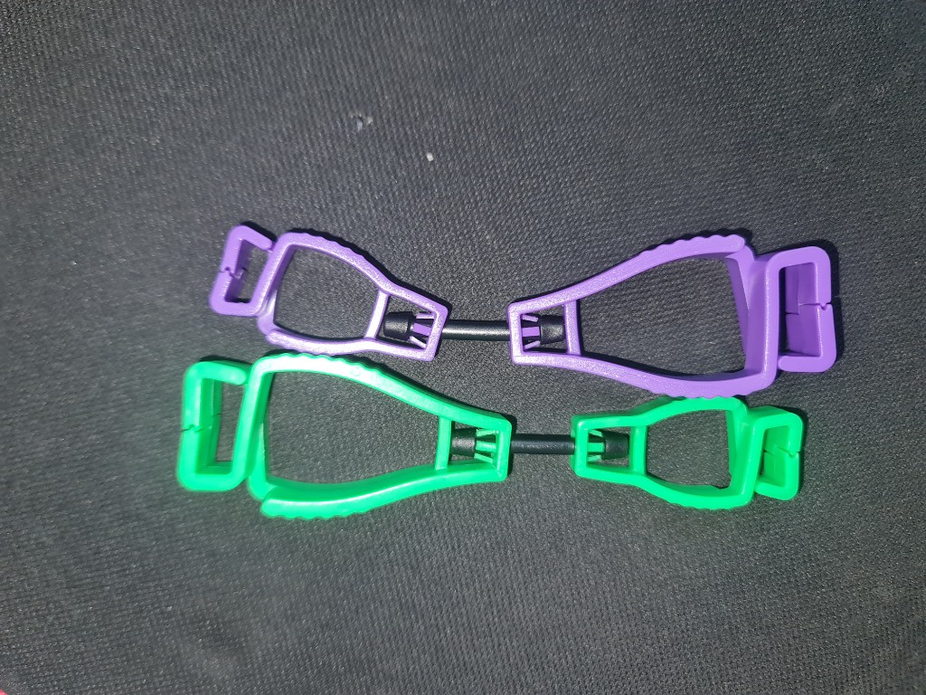 Pinza sujetador de guante