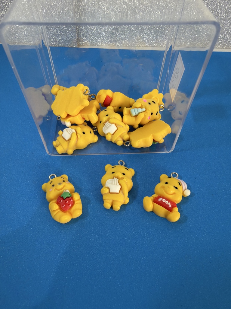 Pingente Resina ursinho amarelo - Uni